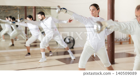 woman at fencing club against the background of athletes 140509089
