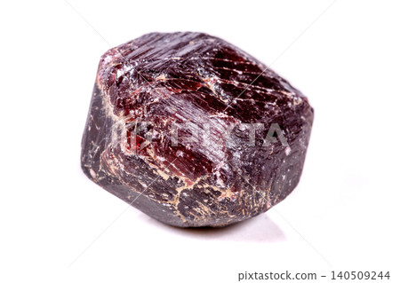 Macro of a mineral garnet stone on a white background 140509244