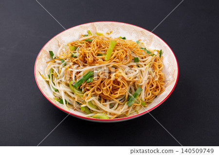 Stir fried noodles with supreme soy sauce and bean sprouts, traditional Cantonese chow mein Stir fried noodles with supreme soy sauce and bean sprouts, traditional Cantonese chow mein 140509749