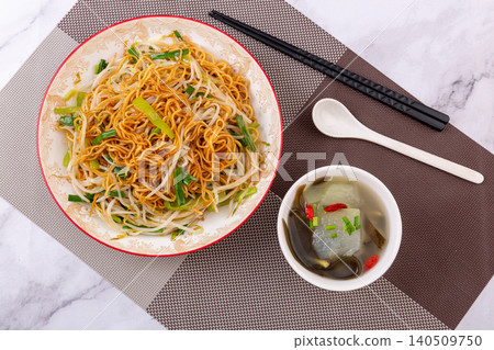 Stir fried noodles with supreme soy sauce and bean sprouts, traditional Cantonese chow mein Stir fried noodles with supreme soy sauce and bean sprouts, traditional Cantonese chow mein 140509750