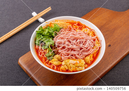 Purple Sweet Potato Noodles in Tomato Sauce with Egg and Cilantro, Chinese Style Purple Sweet Potato Noodles in Tomato Sauce with Egg and Cilantro, Chinese Style 140509756