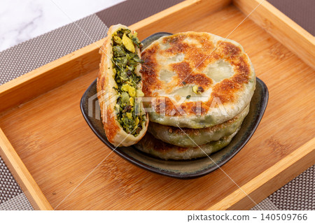 Traditional Chinese Shepherds Purse and Egg Stuffed Pancakes, Savory Flatbread Snack Traditional Chinese Shepherds Purse and Egg Stuffed Pancakes, Savory Flatbread Snack 140509766