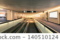 A deserted corridor and moving walkway in a modern airport terminal (unmanned). 140510124