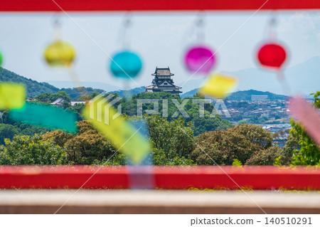 Inuyama Naritasan Temple, Inuyama Castle viewed through wind chimes (Inuyama City, Aichi Prefecture) 140510291