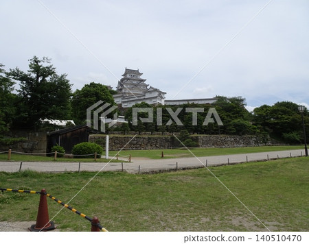 A magnificent panoramic view of Himeji Castle across the plaza. A magnificent panoramic view of Himeji Castle across the plaza. 140510470
