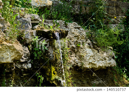 Mountain rock fresh cool source spring among stones 140510737