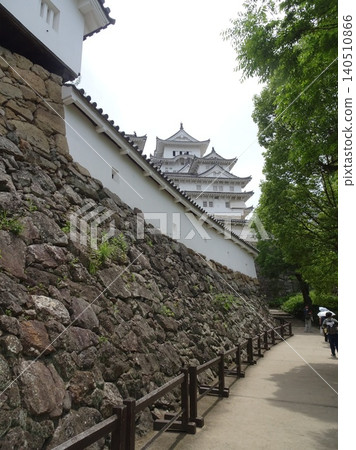 A view of Himeji Castle's keep and stone walls – a magnificent castle architecture that is a World Heritage Site. A view of Himeji Castle's keep and stone walls – a magnificent castle architecture that is a World Heritage Site. 140510866