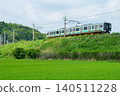 E131 series running on the embankment of the Kashima Line 140511228
