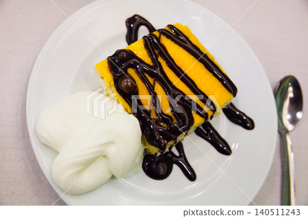 Almond sponge cake with chocolate light mousse and vavilla Almond sponge cake with chocolate light mousse and vavilla 140511243