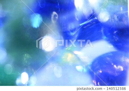 A summery background featuring blue glass beads. A summery background featuring blue glass beads. 140512386
