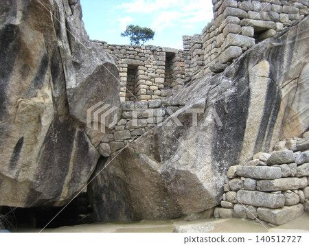 The Temple of the Condor, formed by wing-like megaliths at the Machu Picchu ruins. The Temple of the Condor, formed by wing-like megaliths at the Machu Picchu ruins. 140512727