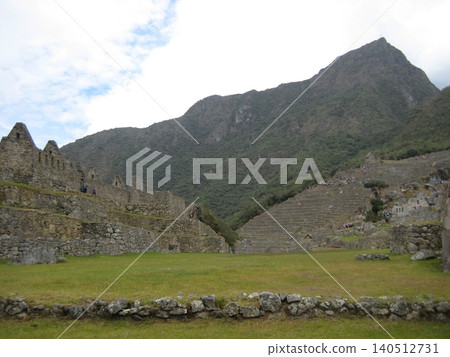 The landscape of the Machu Picchu ruins coexisting with the mountains. The landscape of the Machu Picchu ruins coexisting with the mountains. 140512731