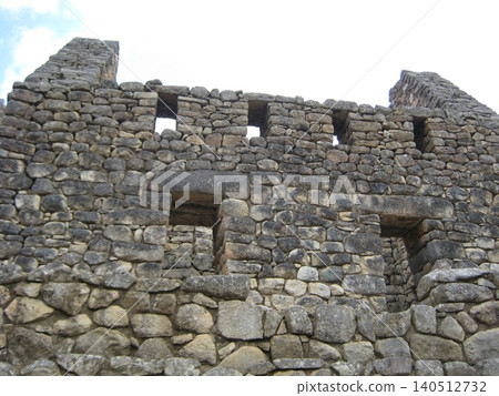 The tall and elaborate stonework of the Machu Picchu ruins 140512732