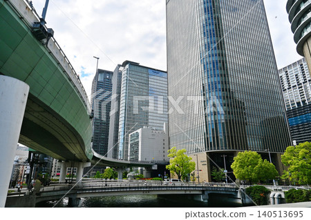 Nakanoshima S-shaped bridge and cluster of skyscrapers in Kita Ward, Osaka City Nakanoshima S-shaped bridge and cluster of skyscrapers in Kita Ward, Osaka City 140513695