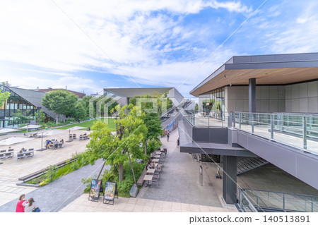 Green Springs Plaza and Cascade, with people relaxing on the terrace seating [Midori-cho, Tachikawa City, Tokyo] 140513891