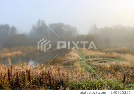 Serene Morning Mist Over Autumn Pond with Distant Gazebo Serene Morning Mist Over Autumn Pond with Distant Gazebo 140515235