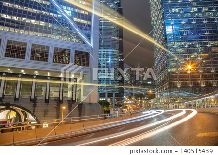 Night Traffic Between Skyscrapers of Hong Kong City Night Traffic Between Skyscrapers of Hong Kong City 140515439