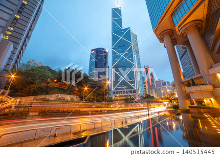 Night traffic on Hong Kong City Streets and Illuminated Skyscrapers Night traffic on Hong Kong City Streets and Illuminated Skyscrapers 140515445