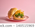 Burger bread with herring on pink background 140515969