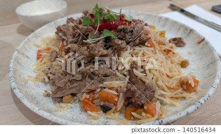 Plov (a type of Uzbek cuisine) Plov (a type of Uzbek cuisine) 140516434