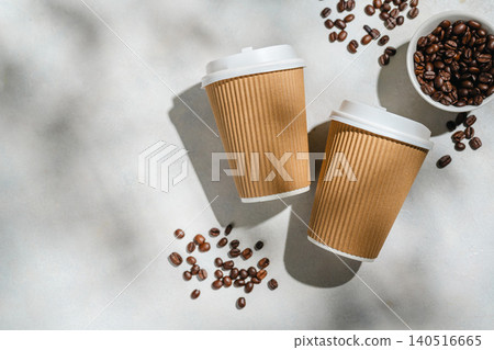 Roasted Coffee Beans and Takeaway Coffee Cups with on Light Background and soft shadows Roasted Coffee Beans and Takeaway Coffee Cups with on Light Background and soft shadows 140516665