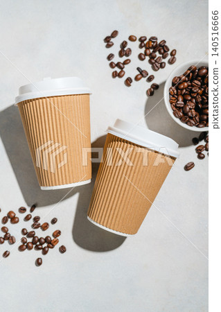 Roasted Coffee Beans and Takeaway Coffee Cups with on Light Background and soft shadows. Copy space 140516666