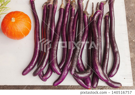 Long purple eggplants at Taiwan market 140516757