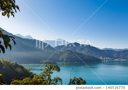Sun Moon Lake misty hill view in Taiwan Sun Moon Lake misty hill view in Taiwan 140516770
