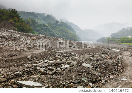 Debris Covered Valley After Mountain Flood Debris Covered Valley After Mountain Flood 140516772