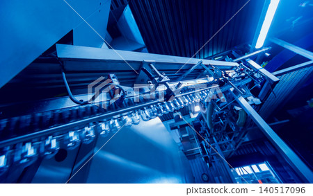 Beverage factory interior. Conveyor with bottles for juice or water. Equipments Beverage factory interior. Conveyor with bottles for juice or water. Equipments 140517096
