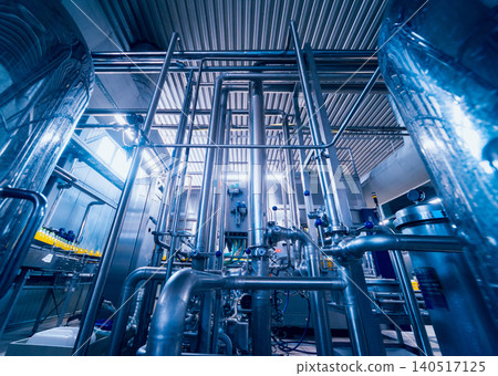 Beverage factory interior. Conveyor with bottles for juice or water. Equipments Beverage factory interior. Conveyor with bottles for juice or water. Equipments 140517125