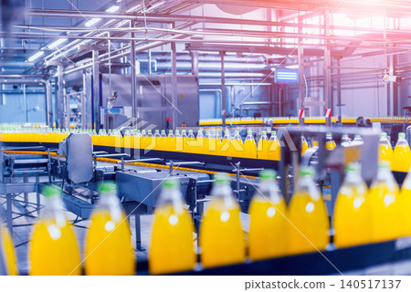 Beverage factory interior. Conveyor with bottles for juice or water. Equipments Beverage factory interior. Conveyor with bottles for juice or water. Equipments 140517137