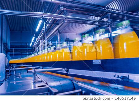 Beverage factory interior. Conveyor with bottles for juice or water. Equipments Beverage factory interior. Conveyor with bottles for juice or water. Equipments 140517149
