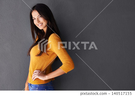 Portrait, trendy and female model in studio, fashion and cool style in gray background. Woman, smile and happy with confidence or pride in mockup space, stylish and edgy in casual outfit or clothes Portrait, trendy and female model in studio, fashion and cool style in gray background. Woman, smile and happy with confidence or pride in mockup space, stylish and edgy in casual outfit or clothes 140517155
