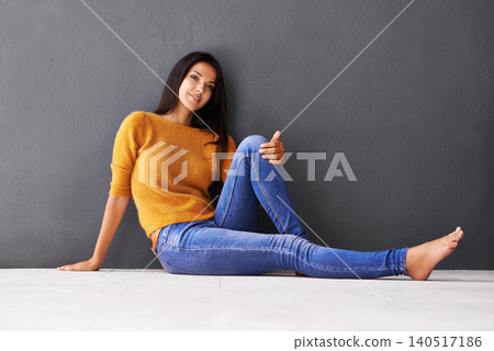 Portrait, smile and woman sit on floor relax with casual outfit for fashion or comfort, leisure and wellness with luxury. Female person, isolated with grey background or wall for clothing with mockup Portrait, smile and woman sit on floor relax with casual outfit for fashion or comfort, leisure and wellness with luxury. Female person, isolated with grey background or wall for clothing with mockup 140517186