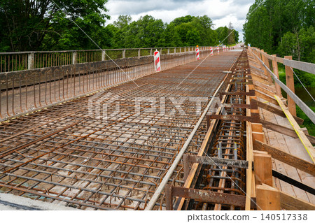 Bridge deck reconstruction over the Barta River in Latvia with steel reinforcement and formwork Bridge deck reconstruction over the Barta River in Latvia with steel reinforcement and formwork 140517338