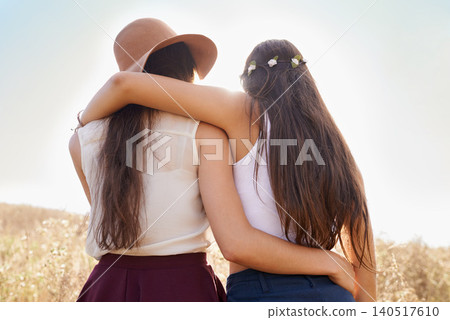 Friends, hug and walking on path in nature on holiday or journey on vacation in summer for adventure. Women, hiking or relax outdoor together on trail in woods, trekking on hill or travel environment Friends, hug and walking on path in nature on holiday or journey on vacation in summer for adventure. Women, hiking or relax outdoor together on trail in woods, trekking on hill or travel environment 140517610