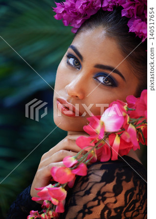 Jungle, portrait or woman with flowers for beauty, natural cosmetics or wellness in nature aesthetic. Color, Indian person or face of model with at eco friendly skincare, plants or spring floral art Jungle, portrait or woman with flowers for beauty, natural cosmetics or wellness in nature aesthetic. Color, Indian person or face of model with at eco friendly skincare, plants or spring floral art 140517654