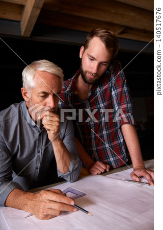 Engineer, team and men with blueprint, thinking or plan for construction with serious father teaching son. Architecture, apprentice and senior mentor drawing design for problem solving in workshop Engineer, team and men with blueprint, thinking or plan for construction with serious father teaching son. Architecture, apprentice and senior mentor drawing design for problem solving in workshop 140517676