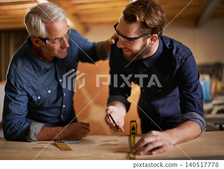 Architecture, teamwork and senior mentoring man in workplace of workshop, pencil and drawing. Male people, professional and working with measuring tape on wooden table for planning of renovation 140517778