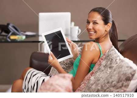 Screen, tablet and portrait of happy woman on a sofa with social media, scroll or ebook at home. Digital, space or female person in a living room with movie app search, relax and chill Screen, tablet and portrait of happy woman on a sofa with social media, scroll or ebook at home. Digital, space or female person in a living room with movie app search, relax and chill 140517910