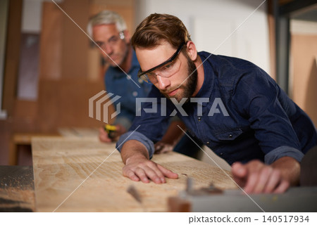 Solution, father and son in a workshop, wood and safety glasses with gear and teamwork with choice. Architect, men and tools with construction and building with planning for project and renovation Solution, father and son in a workshop, wood and safety glasses with gear and teamwork with choice. Architect, men and tools with construction and building with planning for project and renovation 140517934