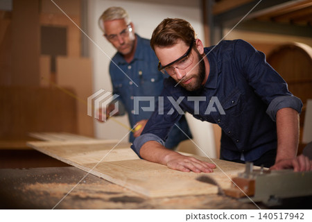 Wood, father and son in a workshop, architect and carpenter with renovation or safety glasses with protection. Parent, men or teamwork with construction or building with planning for project or gear Wood, father and son in a workshop, architect and carpenter with renovation or safety glasses with protection. Parent, men or teamwork with construction or building with planning for project or gear 140517942