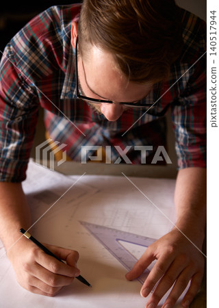 Closeup, man and architect sketch blueprint, construction for engineering and renovation project with drawing tools. Floor plan, design and property development with architecture and creativity 140517944