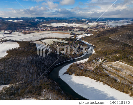 Brno dam from a drone in winter - Czech Republic. Landscape with nature in winter time and frozen water. Brno dam from a drone in winter - Czech Republic. Landscape with nature in winter time and frozen water. 140518180