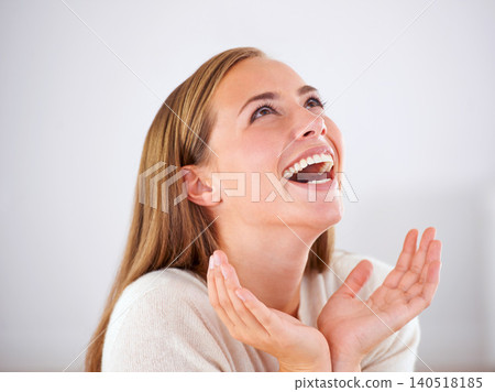 Laughing, woman and happiness in studio with funny, comedy or reaction to humor in white background. Crazy, joke and girl giggle with joy from thinking of moment in comic or person with a smile 140518185