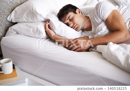 Man, rest and bed for peace, wellness and sleeping in pajamas and bedroom for home and eyes closed. Muscular male person, relax and dreaming at house, calm and tired and taking nap to chill. Man, rest and bed for peace, wellness and sleeping in pajamas and bedroom for home and eyes closed. Muscular male person, relax and dreaming at house, calm and tired and taking nap to chill. 140518225