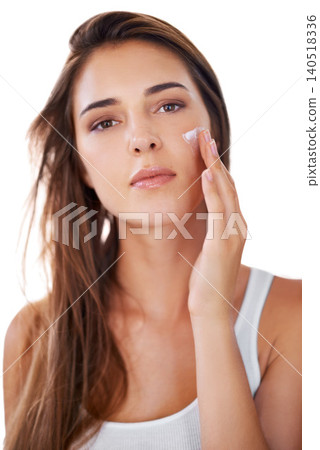 Portrait of woman, moisturiser or skincare for facial beauty or cosmetics for dermatology on white background. Face cream, results or confident person with natural lotion shine or wellness in studio Portrait of woman, moisturiser or skincare for facial beauty or cosmetics for dermatology on white background. Face cream, results or confident person with natural lotion shine or wellness in studio 140518336