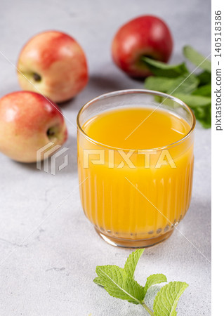 Glass of nectarine juice with fresh fruit and mint Glass of nectarine juice with fresh fruit and mint 140518386