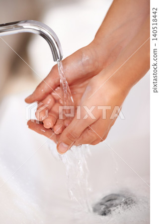 Person, water and soap on hands for cleaning in skincare, routine or grooming in home closeup. Bathroom, tap or washing skin with foam for sanitary protection of hygiene from germs, bacteria or virus Person, water and soap on hands for cleaning in skincare, routine or grooming in home closeup. Bathroom, tap or washing skin with foam for sanitary protection of hygiene from germs, bacteria or virus 140518442